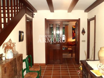 Hall, al fondo salón
