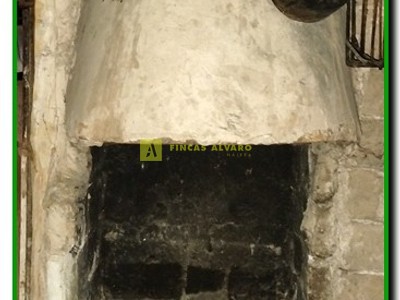 Hogar de leña en bajocubierta