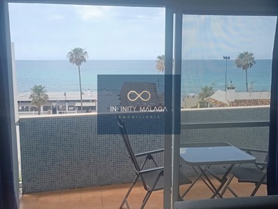 Piso en venta en Torrox, con 2 dormitorios, baño, plaza de garaje, trastero y terraza